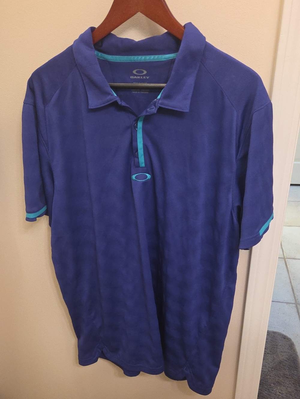 Oakley Men's Royal Blue Polo with Teal Accents